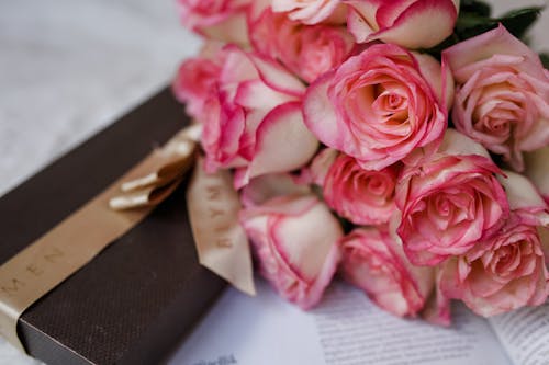 A Close-Up Shot of Bouquet of Pink and White Roses