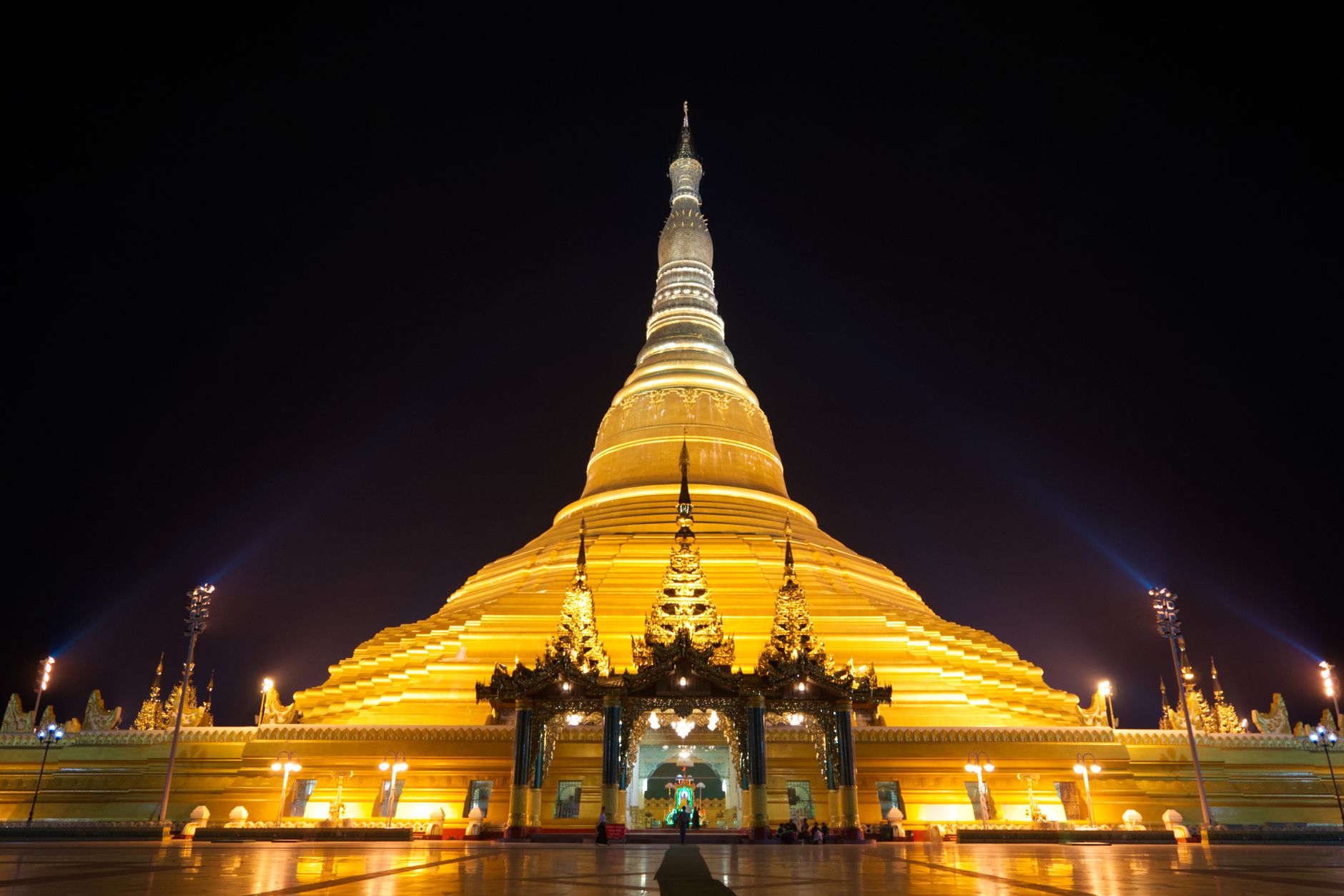 Spectacular night view of the glowing Uppatasanti Pagoda in Naypyitaw, Myanmar.