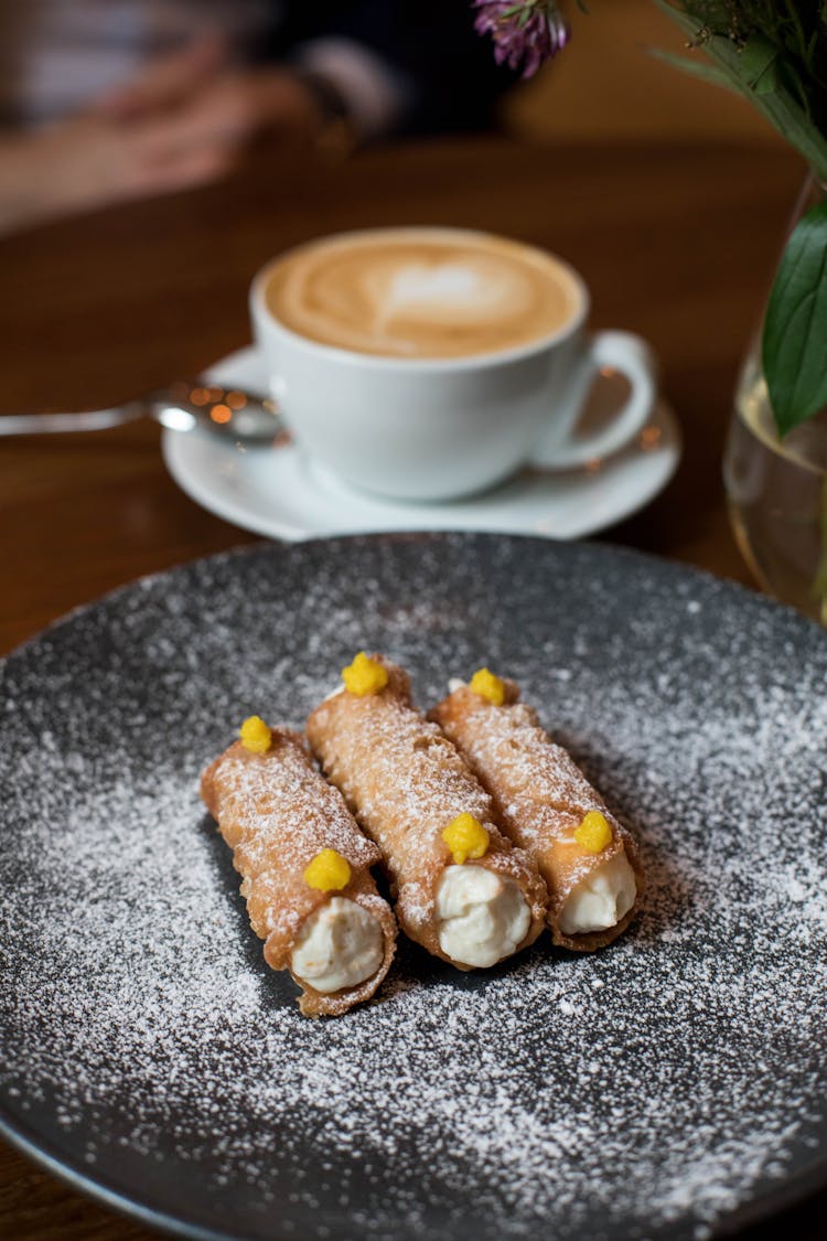 Cannoli Dessert Near Coffee In Cafeteria