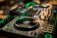 Selective focus of glowing music controller for music mixing and turntables on console