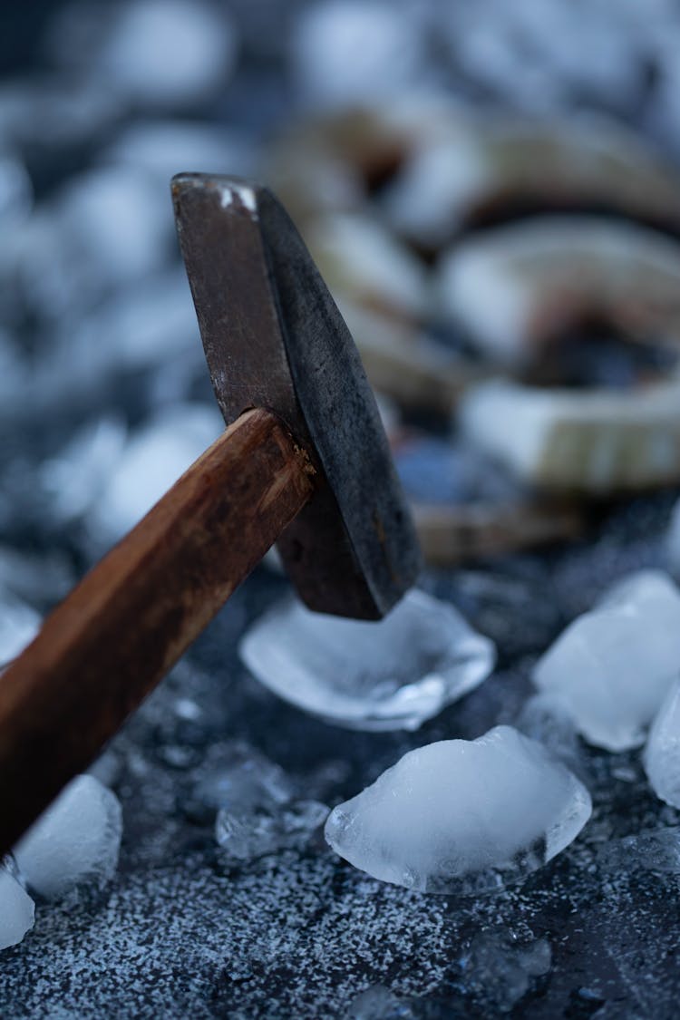 Hammer Breaking Piece Of Ice