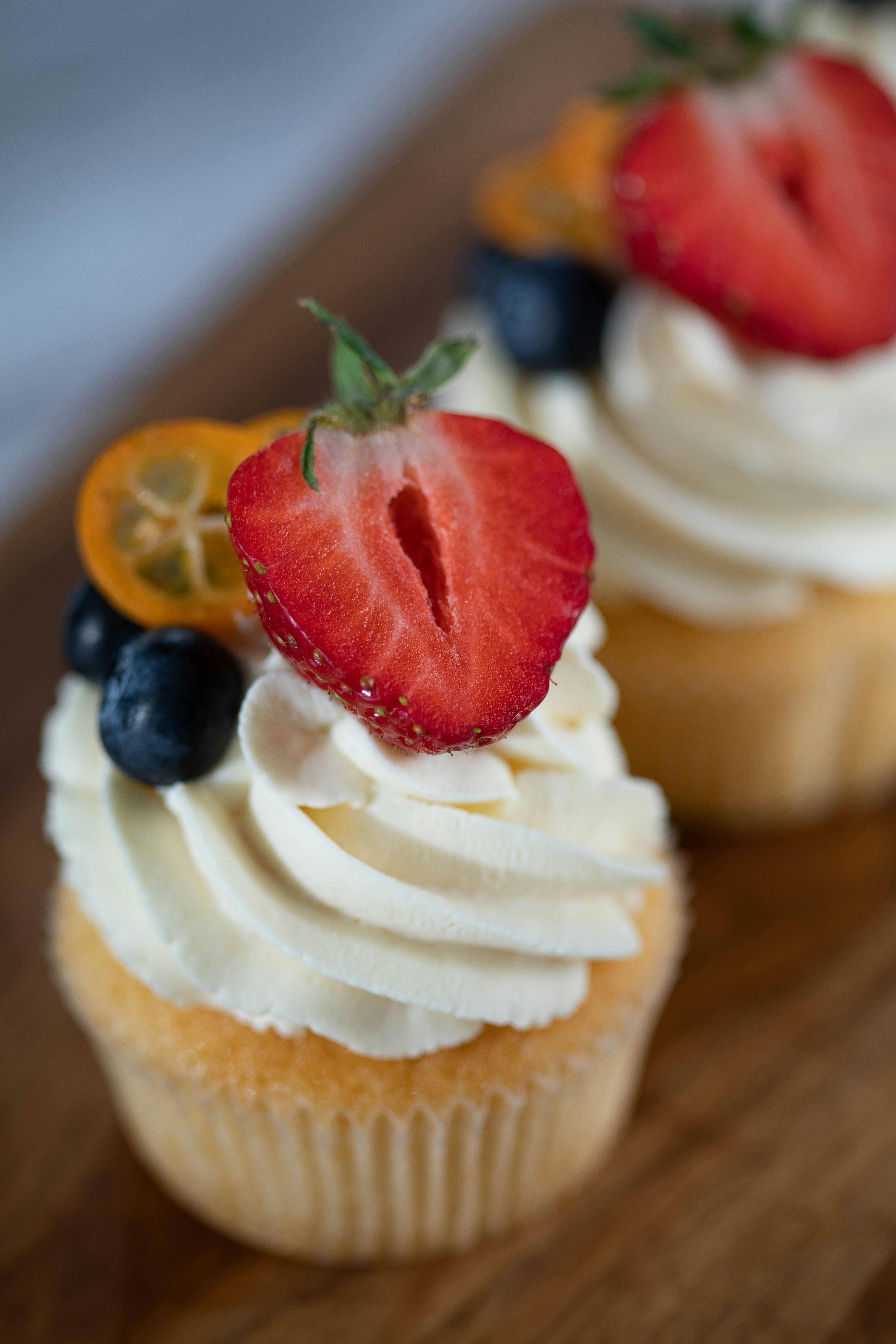Yummy muffin with berries and whipped cream · Free Stock Photo
