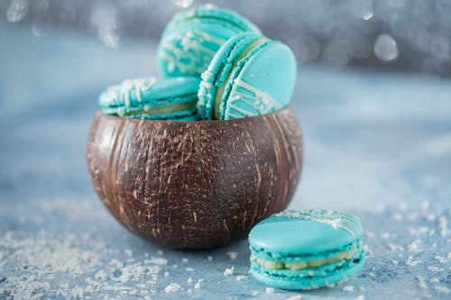 Free Delicious macaroons in coconut shell Stock Photo