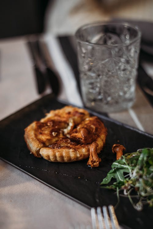 Free Delicious quiche served with greens Stock Photo