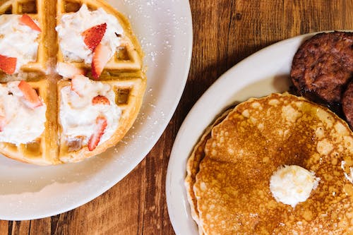Free Waffles and Pancakes White Ceramic Plates Stock Photo