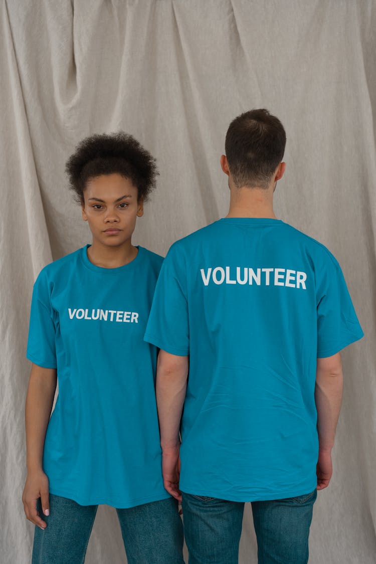 Volunteers Wearing Blue Crew Neck T-Shirts 