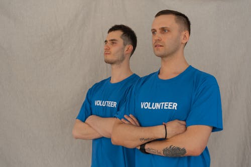 Free Photo of Volunteers Crossing Their Arms Stock Photo