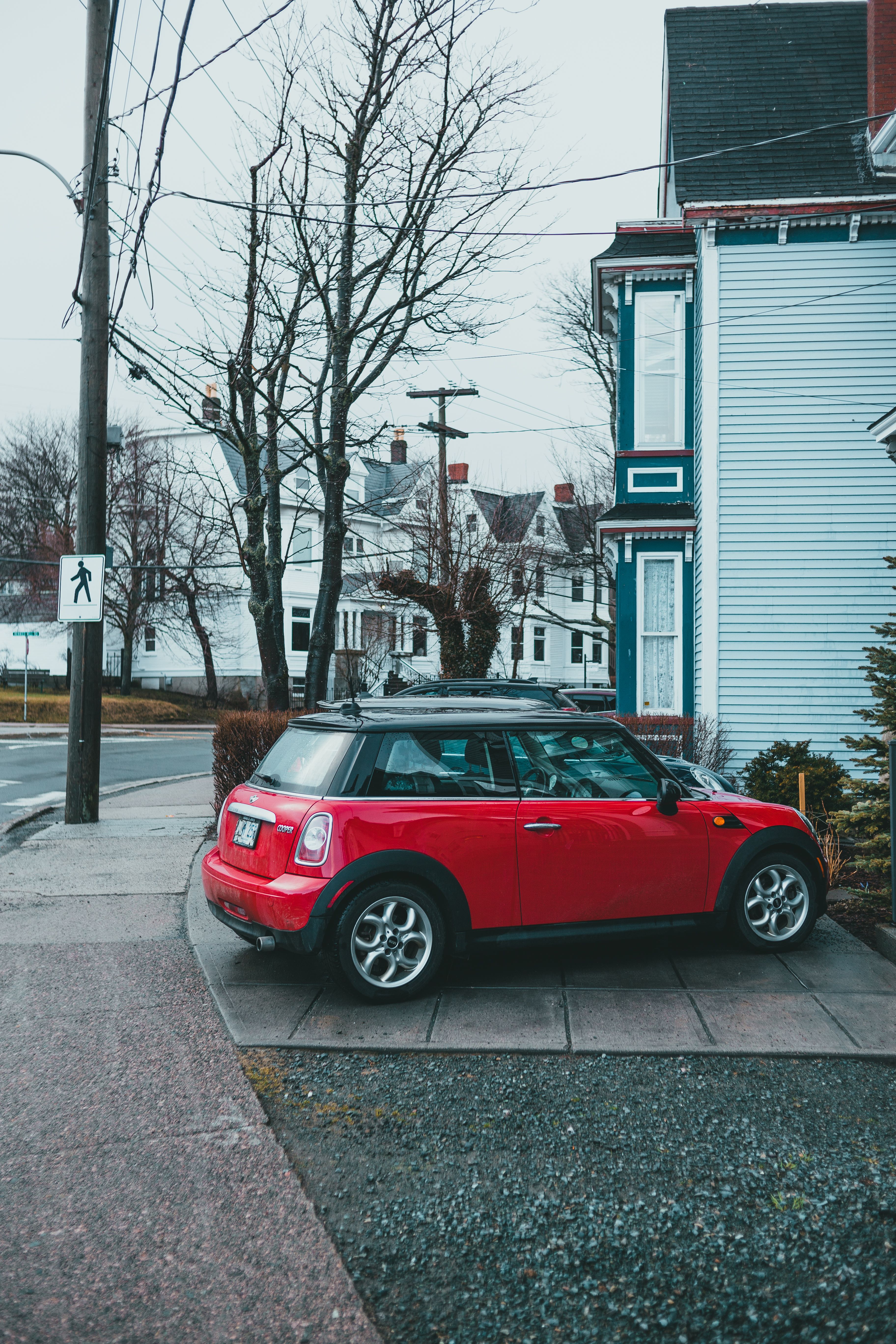 Yellow Mini Cooper Parked Beside White Concrete Building · Free Stock Photo