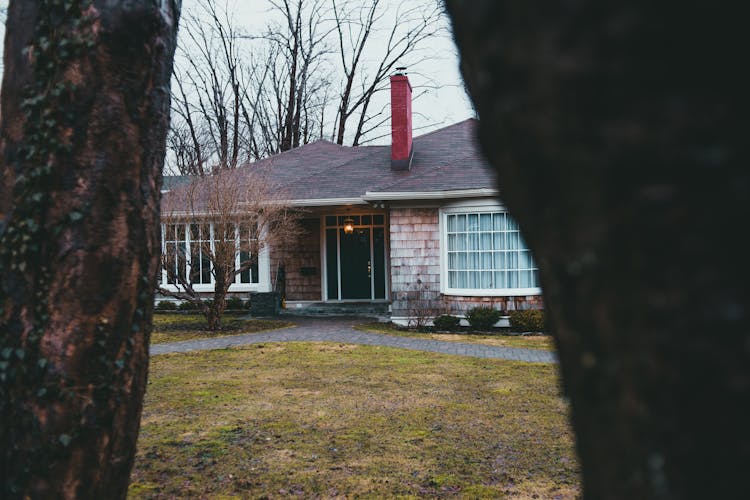 Old Shabby Brick House With Chimney