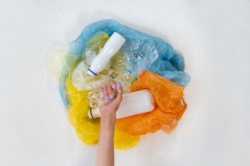 Free A Pile of Plastic Bags and Plastic Bottles Stock Photo