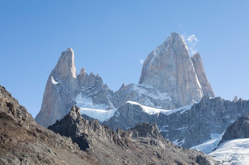 Sharp Mountain Peaks against Blue Sky