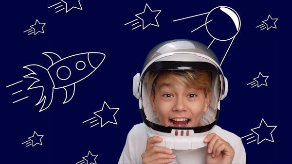 young boy in astronaut outfit