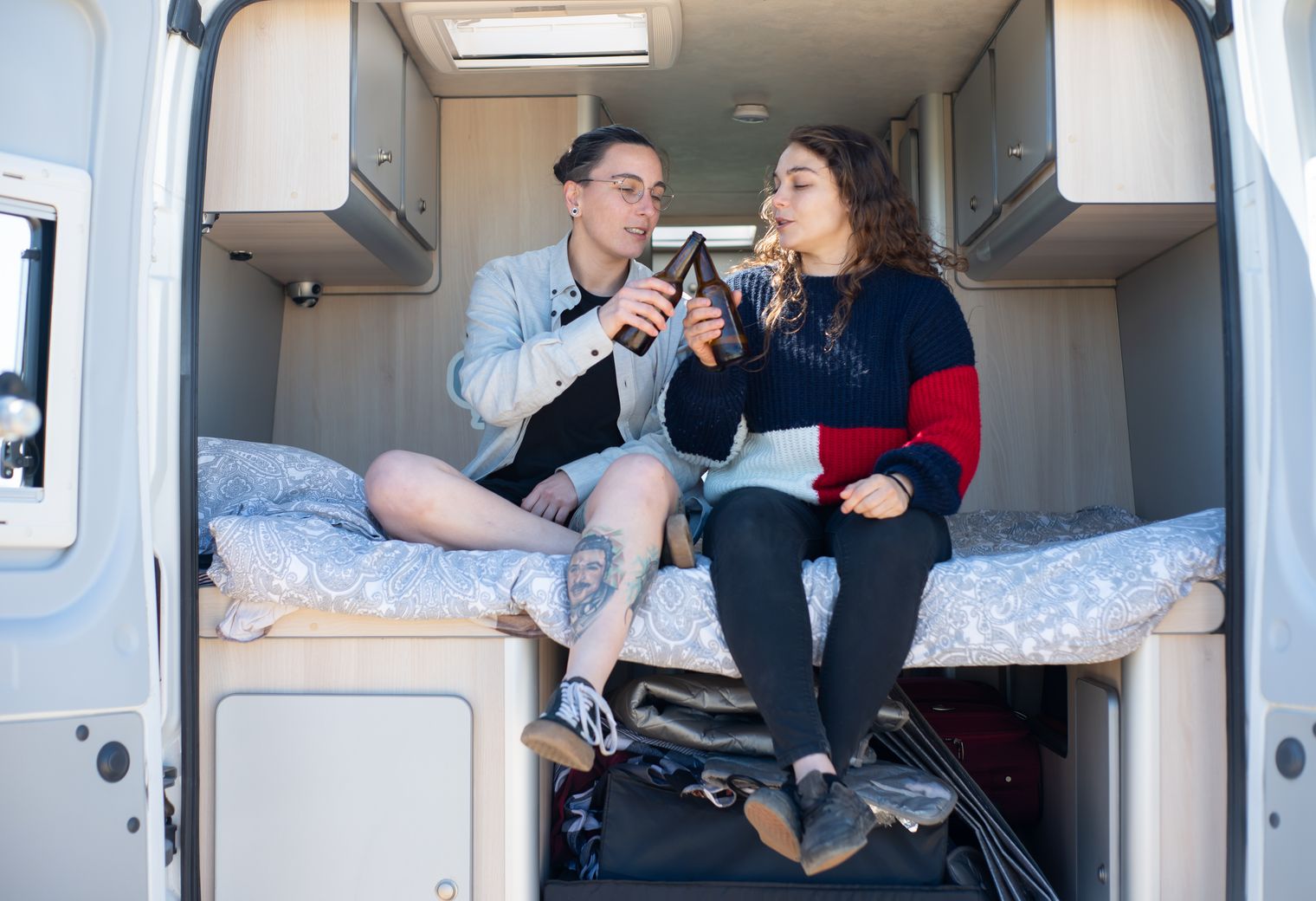 Cheltenham — movers delivering furniture from a van