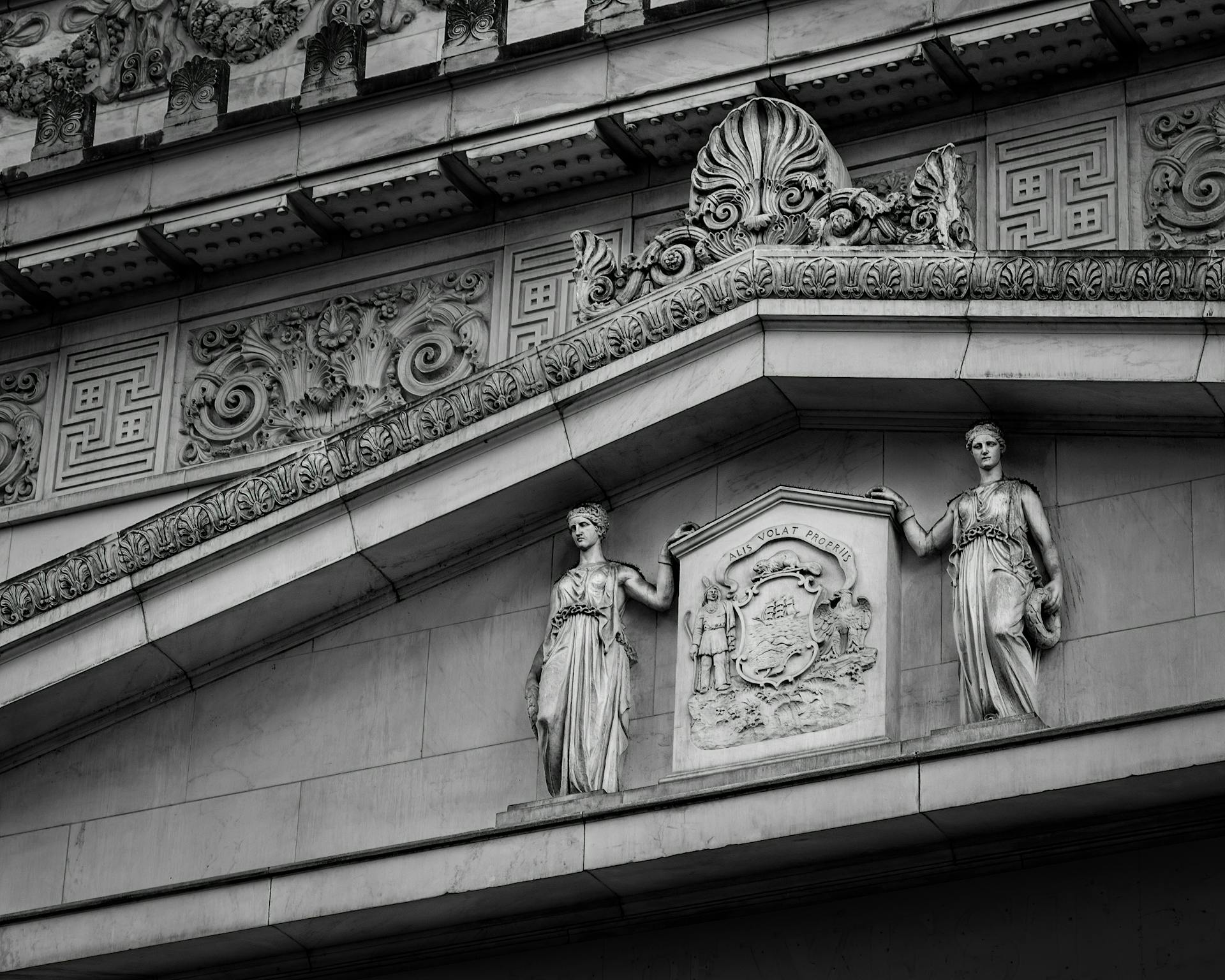 Full frame detail of famous historic public bank with frieze and creative ornamental elements located on street of Portland city