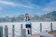 Girl Leaning on Railing