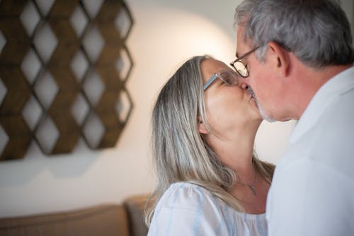 Photo of an Elderly Couple Kissing