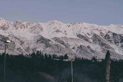 Snow Covered Mountain Under the Blue Sky