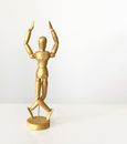 Brown Wooden Human Figure on Brown Wooden Table