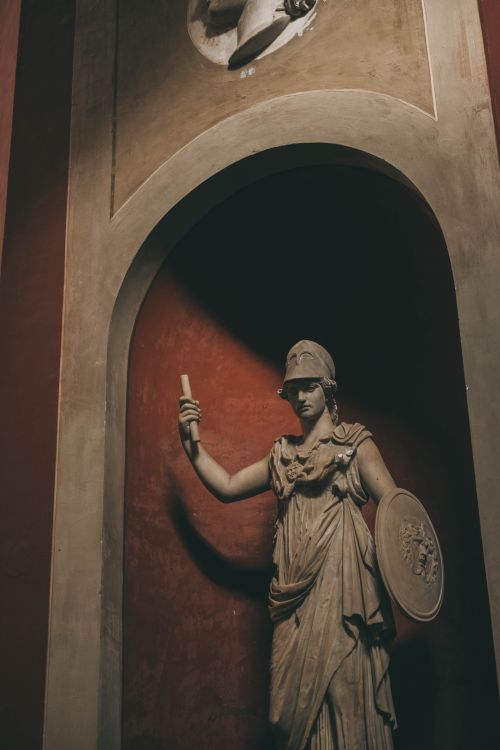 Free Explore the intricate details of a marble sculpture of a Roman goddess on display in Italy. Stock Photo