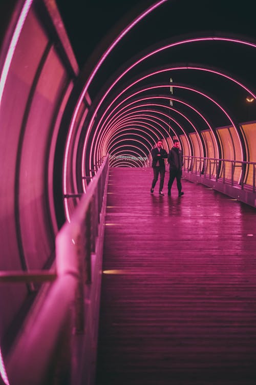 Free 2 Person Walking on Tunnel Stock Photo