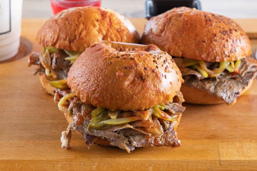 Burger on Brown Wooden Table