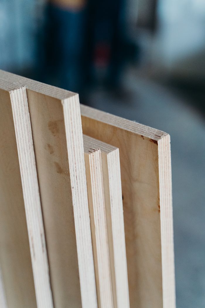 Close-up of layered plywood sheets showing grain and edge texture
