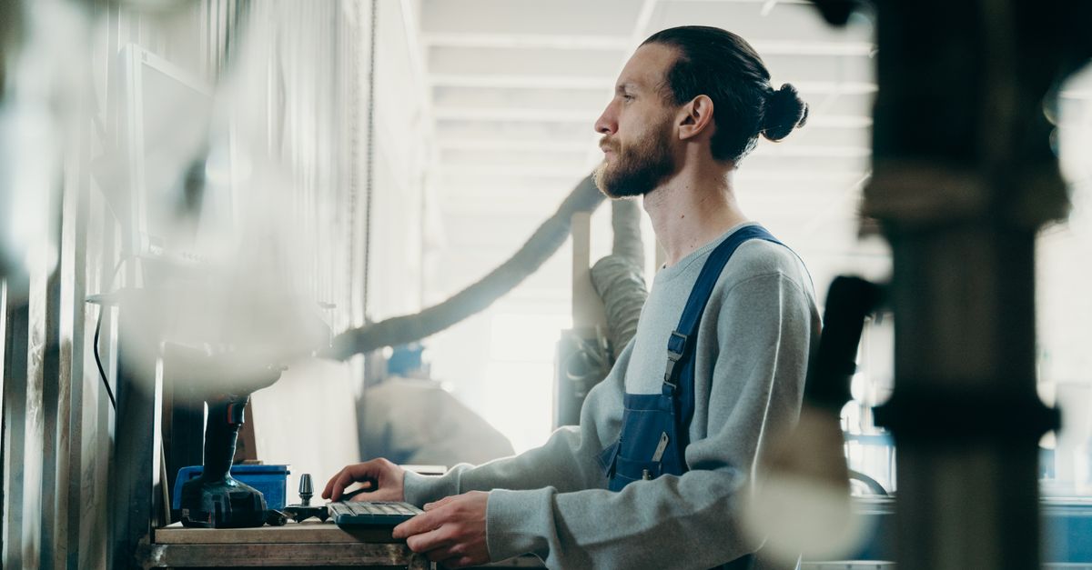A Man Using Computer · Free Stock Photo