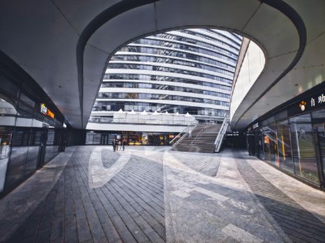 Explore modern architecture amidst Beijing's vibrant urban scenery at Chaoyang District.