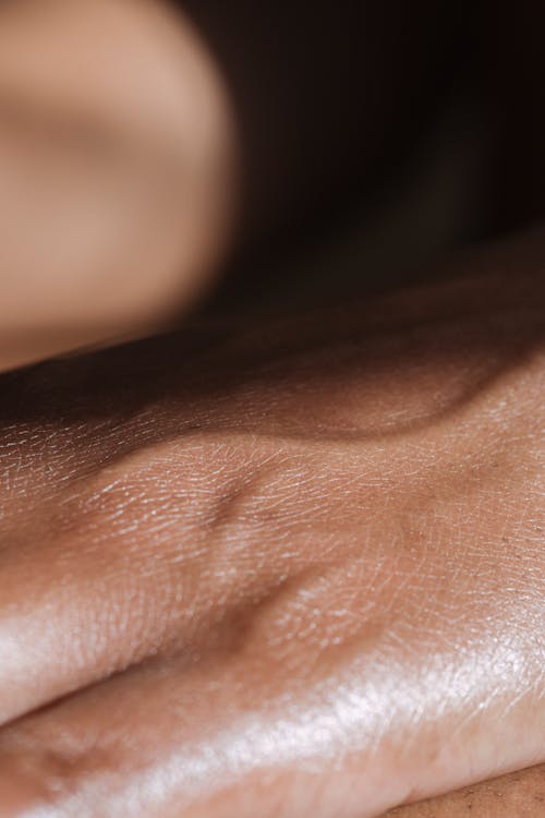 Free Close Up Photo of a Person's Hand Stock Photo