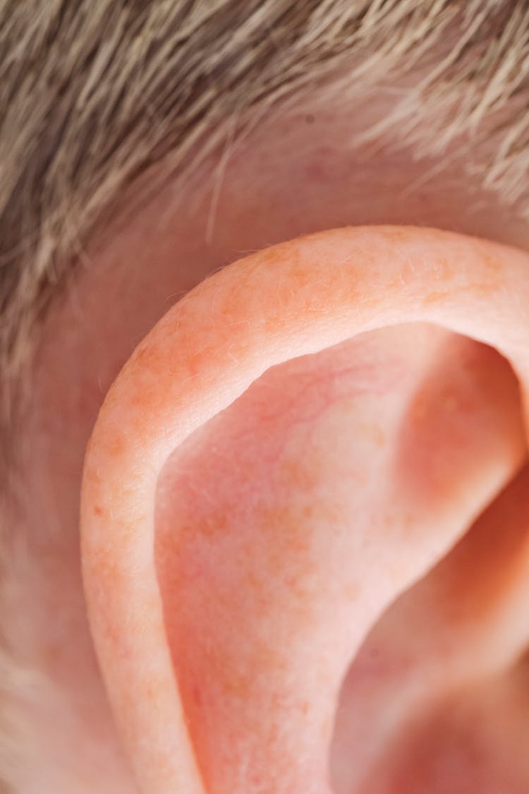 Person's Ear In Close Up Photography