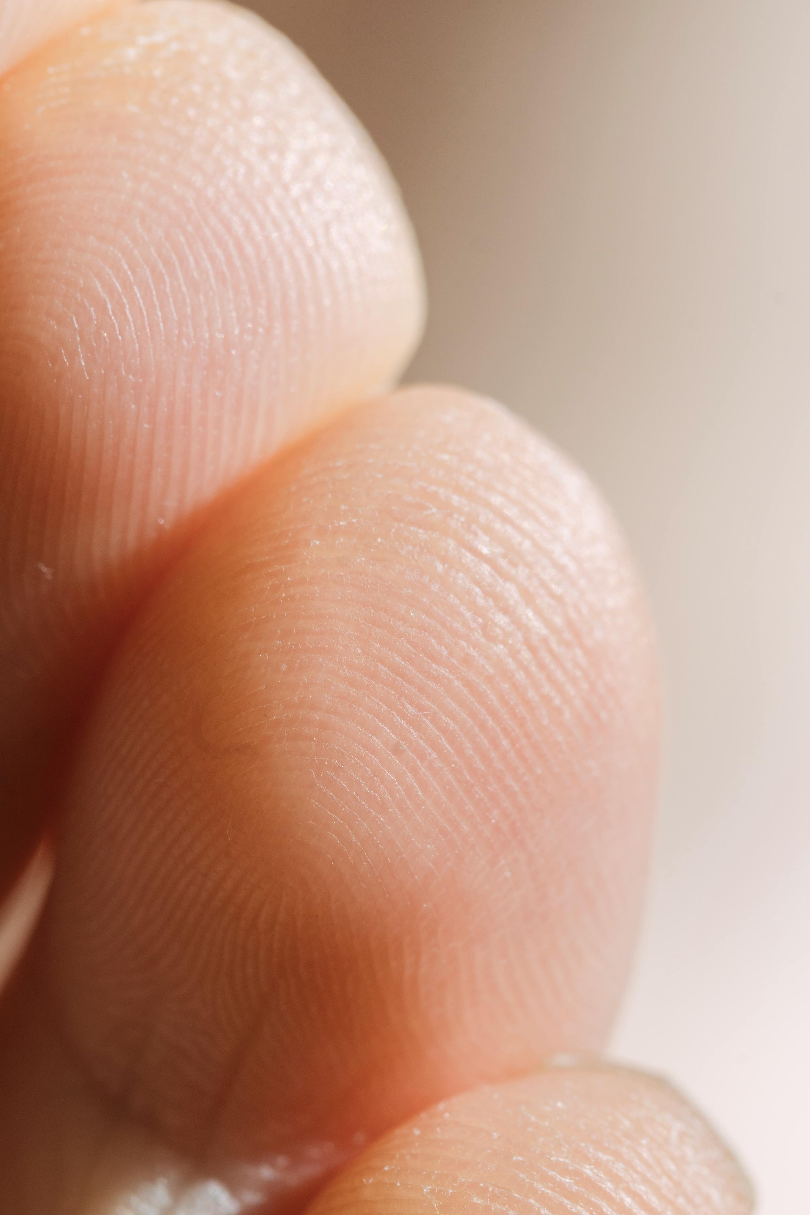 finger tips of faceless person