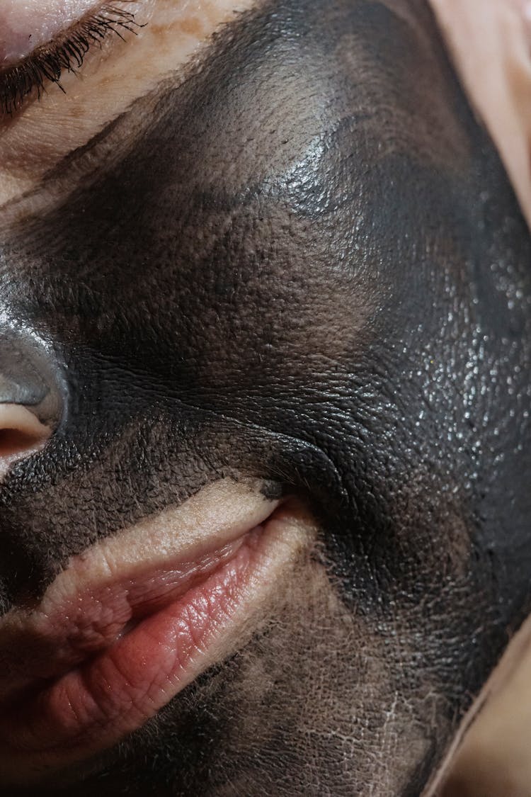 Chin And Cheek Of Crop Woman With Clay Mask