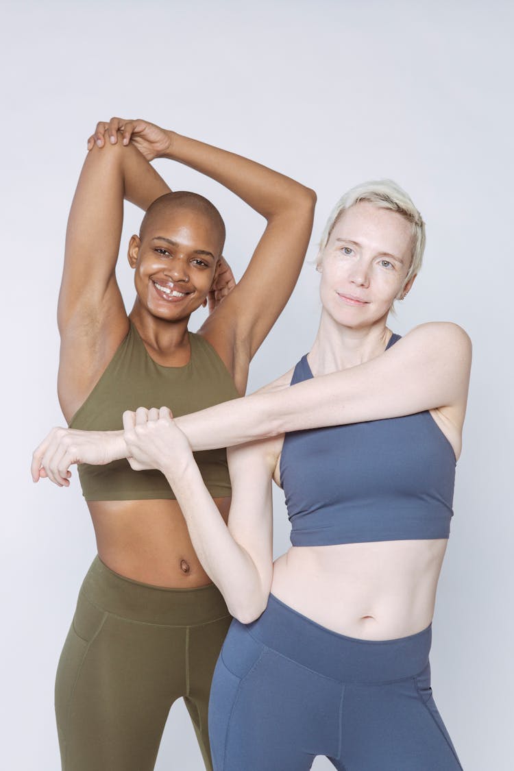 Content Diverse Fit Women Stretching Arms