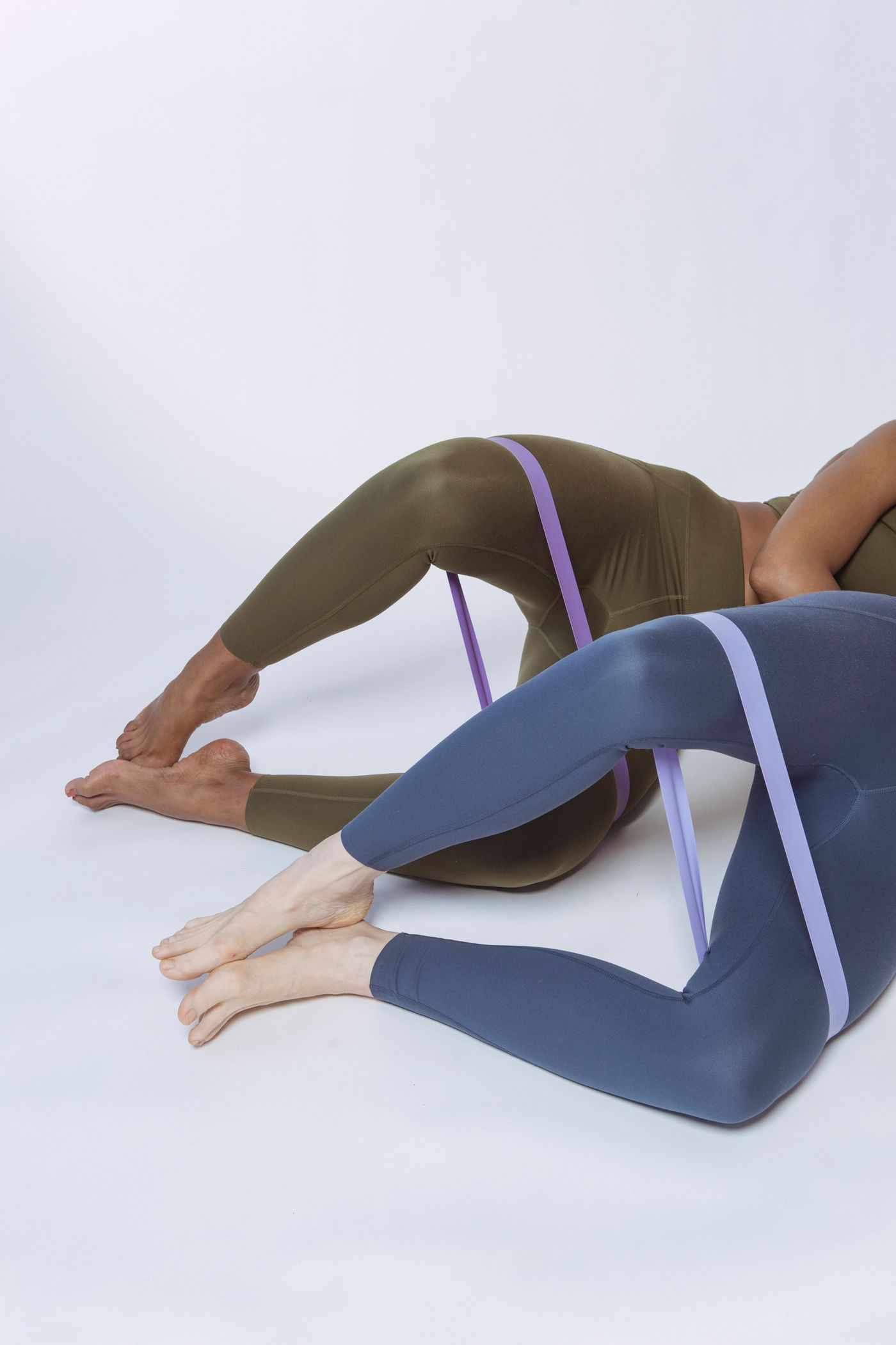 Athletes using resistance bands for controlled mobility training