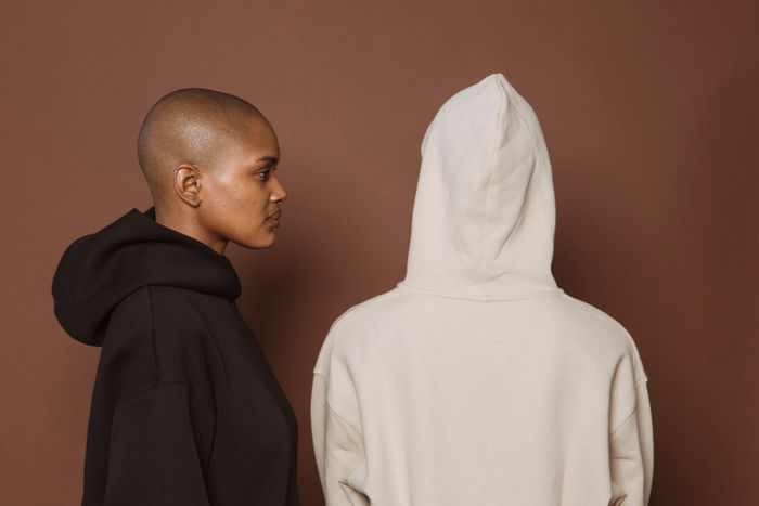 Model in an oversize hooded sweatshirt — photo by Angela Roma on Pexels