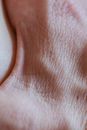 From above of skin with veins between thumb and index fingers of hand of unrecognizable person in daylight