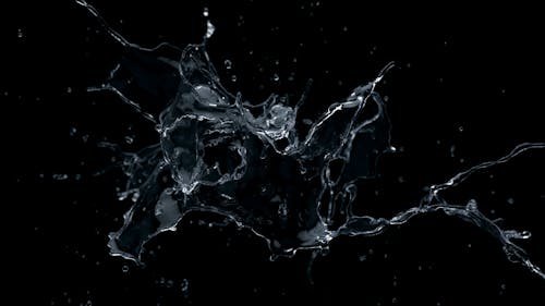 Foto d'estoc gratuïta de aigua, esquitxada, fons negre