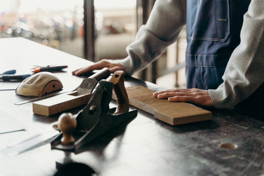 A joiner fitting a hand-finished component
