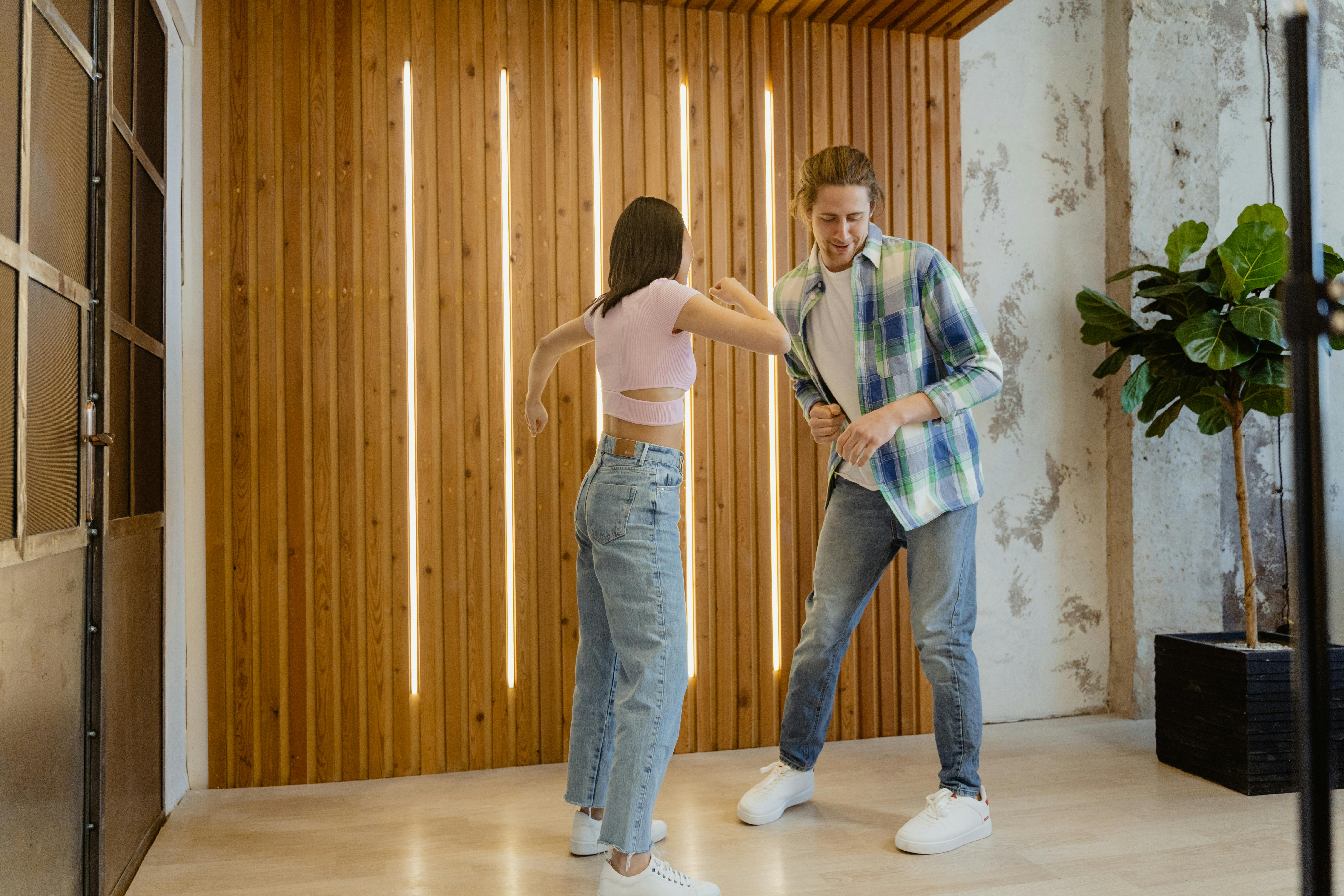 a man and woman dancing together