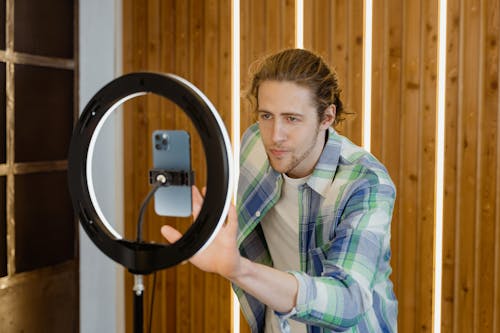 A Man Setting Up His Smartphone