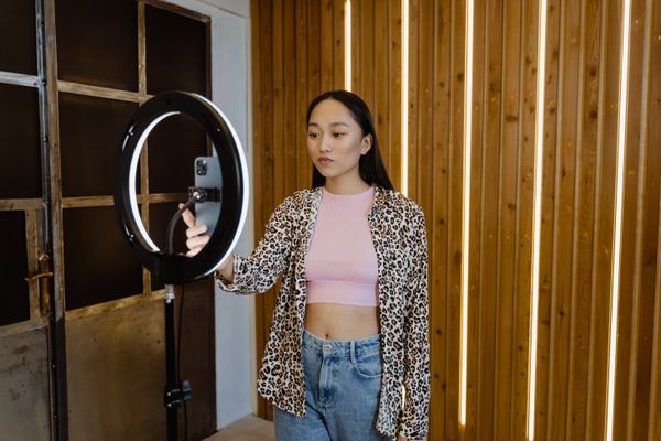 Influencer filming with ring light
