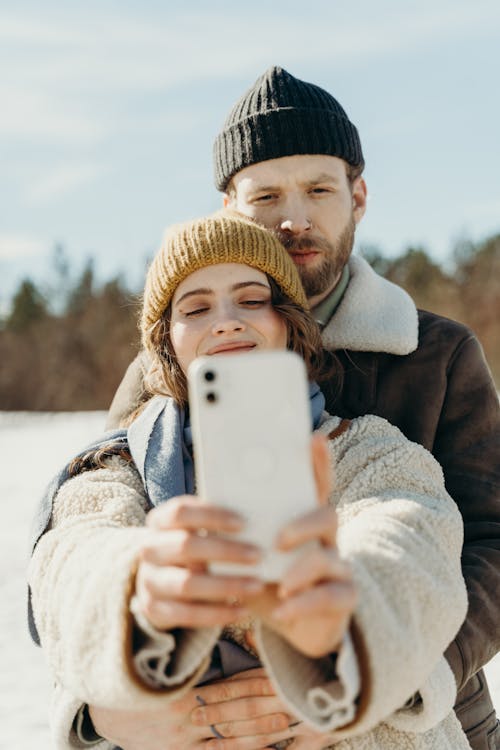Free Woman Taking Selfie with a Man Stock Photo