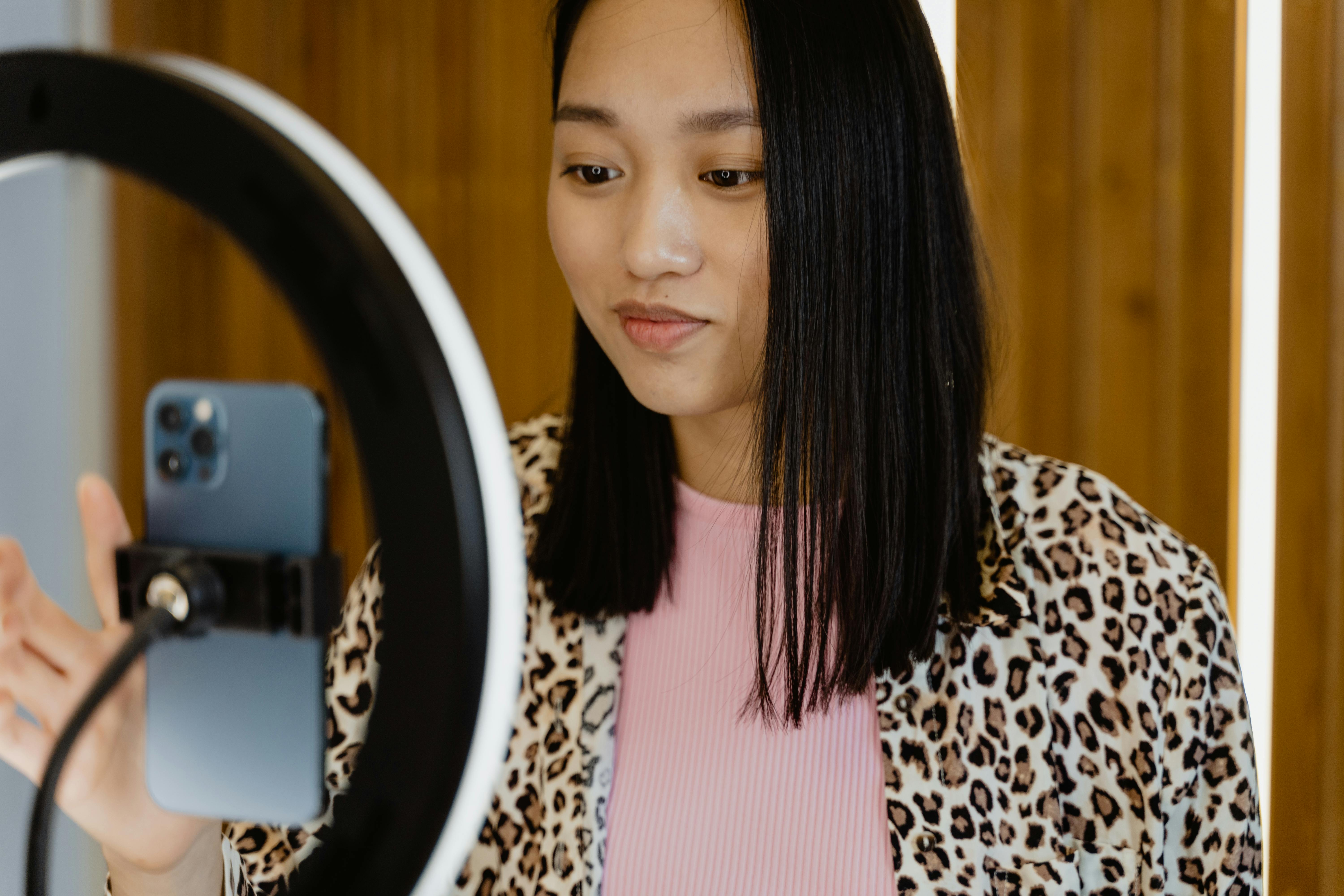 woman in black and white leopard print long sleeve shirt