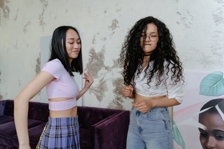 Two Women In Casual Clothing Dancing