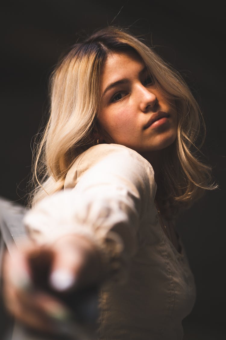 Woman In White Blouse Reaching Her Hand