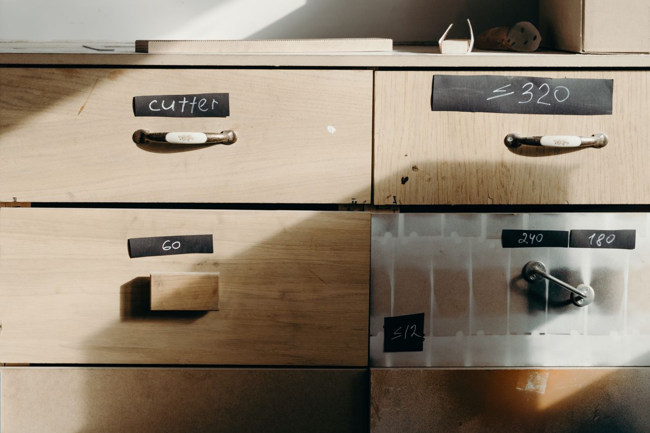 Labelled drawer storage under a bench