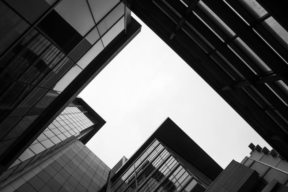 Low Angle Photo of Glass Building · Free Stock Photo