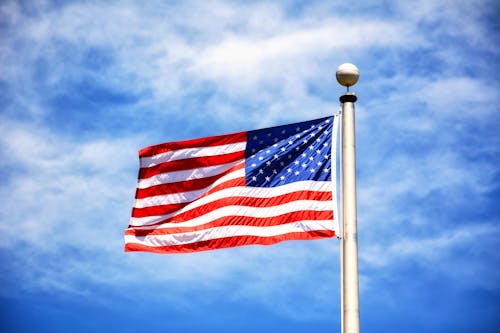 Безкоштовне стокове фото на тему «американський прапор, блакитне небо, махання»