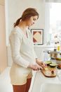 Woman in White Long Sleeve Shirt Holding White Ceramic Plate