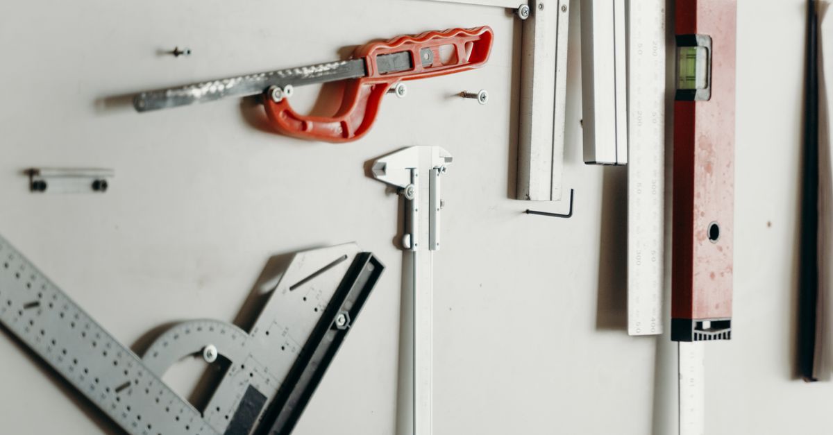 Carpentry Tools on a White Surface · Free Stock Photo